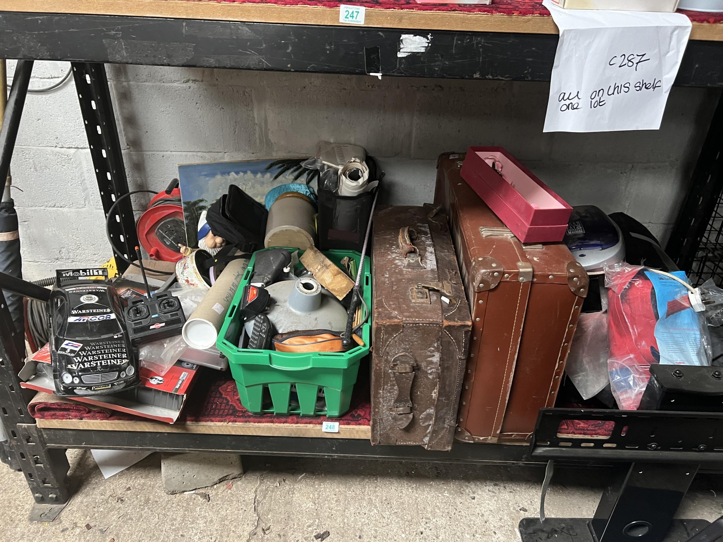 mixed shelf bric a brac vintage suitcases etc..
