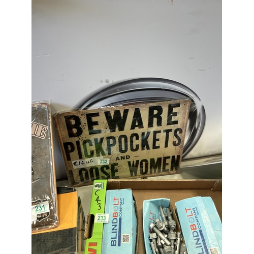 232 - Beware pickpockets and loose women sign