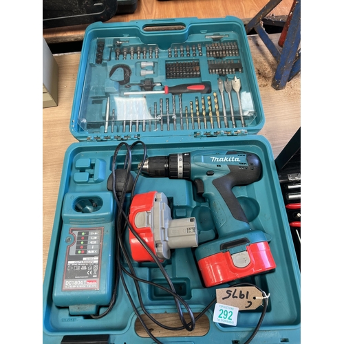 292 - Cordless Makita drill with batteries with charger