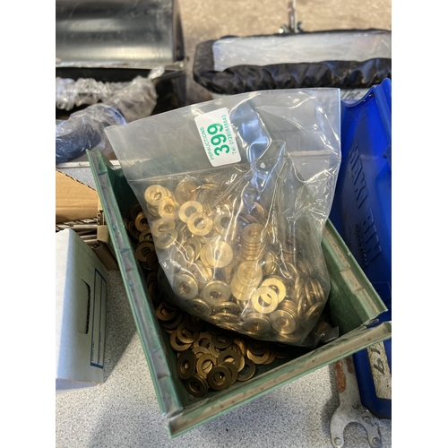 399 - Green lin bin full of brass washers