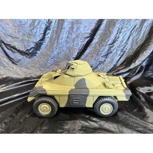 Action man deals scout car