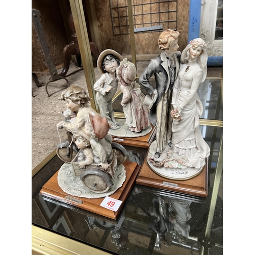 49 - X3 figurines