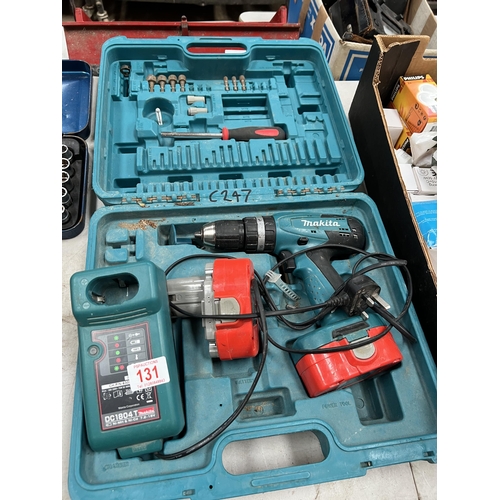 131 - Makita cordless drill set