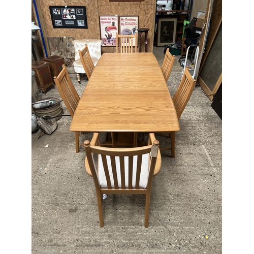 1430 - Ercol Windsor dinning table & 6 chairs with 3 extra leafs in fabulous conditions measurements wi... 