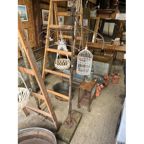 1446 - ornate metal plant support in shape of umbrella stands 77” tall x  32” diameter over 6Ft