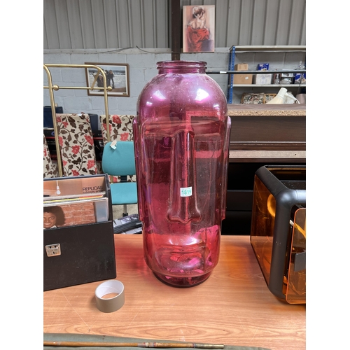 1819 - large pink glass Easter island head bottle