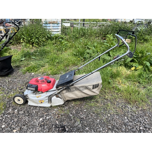 545 - Honda petrol mower with grass bag SOLD AS SEEN