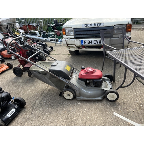 547 - Honda petrol mower with grass bag SOLD AS SEEN