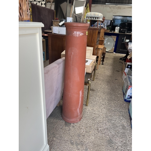 257 - tall terracotta chimney pot