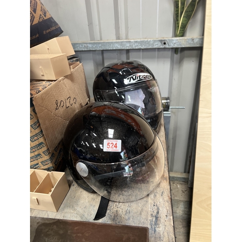 524 - 2 x motorbike helmets