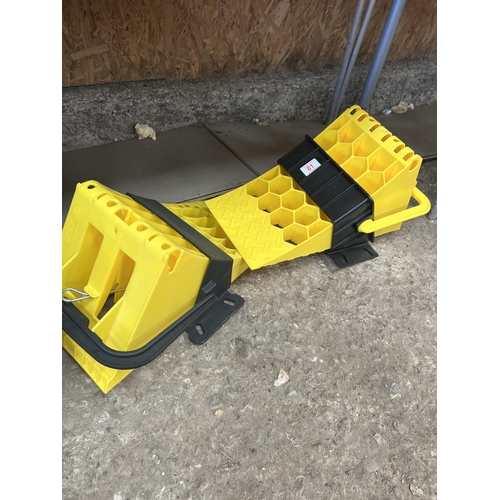 81 - pair new wheel chocks