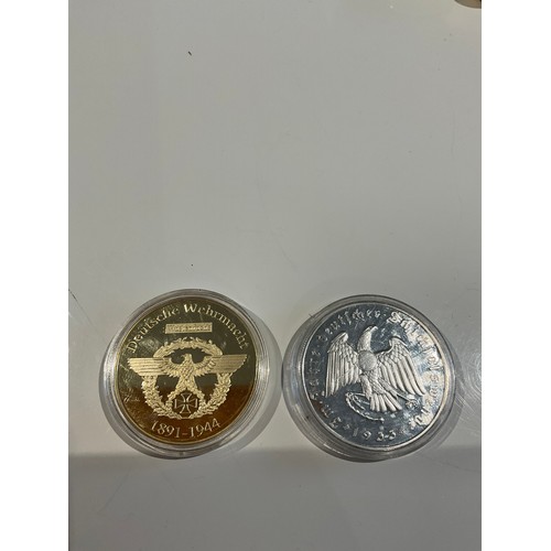 153 - 2 x German coins in capsules , one gold coloured , one silver coloured