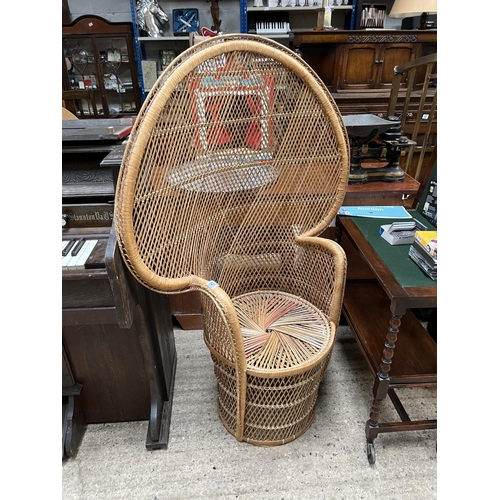 541 - vintage 70’s peacock wicker chair