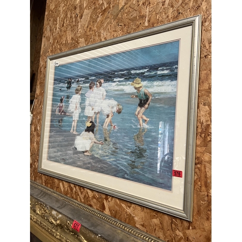 576 - Large framed print children playing in sea