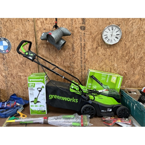 29 - Greenworks 48v cordless lawn mower , blower & strimmer with batteries & charger