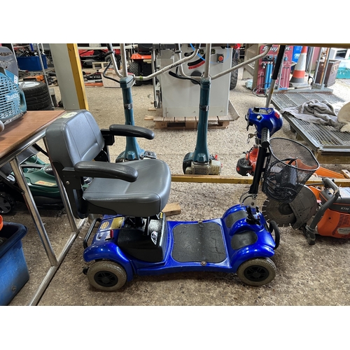 4 - Mobility scooter with charger , needs new batteries