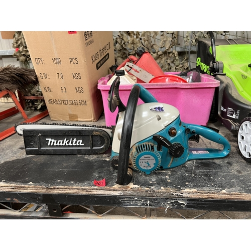 401 - Makita petrol chainsaw plus crate accessories