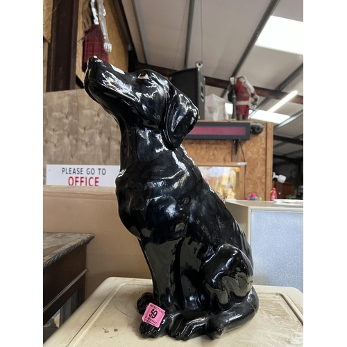 59 - large ceramic black dog...