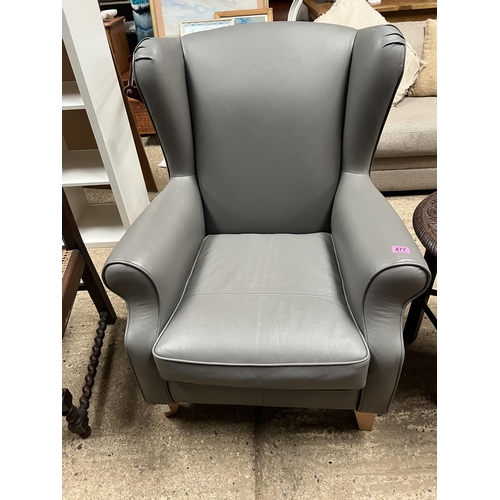 477 - grey leather wing back arm chair