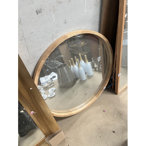 565 - wood framed circular mirror