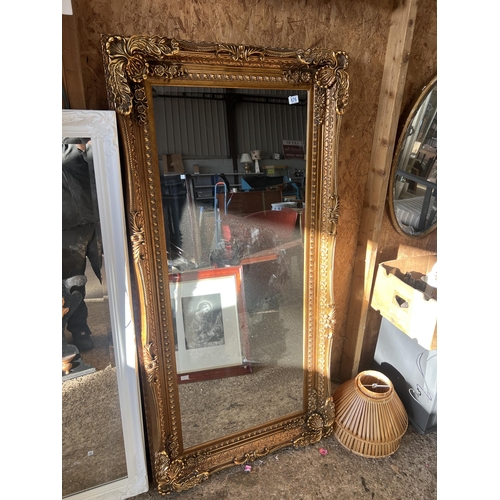 676 - large gold framed mirror