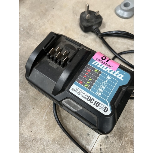 57 - Makita DC10WD new battery charger...