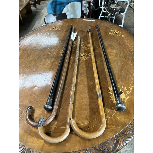 273 - 5 x walking sticks / canes with silver tops / bands