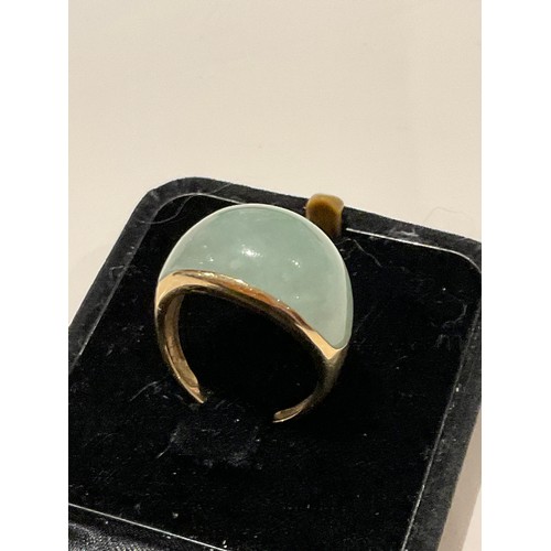 21 - 9ct gold & jade cocktail ring, hallmarked / stamped 9ct , domed shaped ring with , good side 34.... 