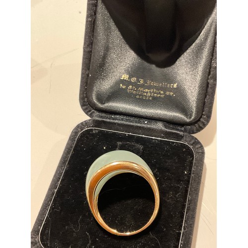 21 - 9ct gold & jade cocktail ring, hallmarked / stamped 9ct , domed shaped ring with , good side 34.... 