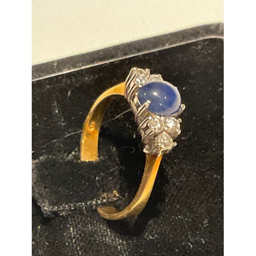 27 - 18ct gold Diamond / caversham Sapphire , dazzling diamonds 3 either side of a centre blue domed sapp... 