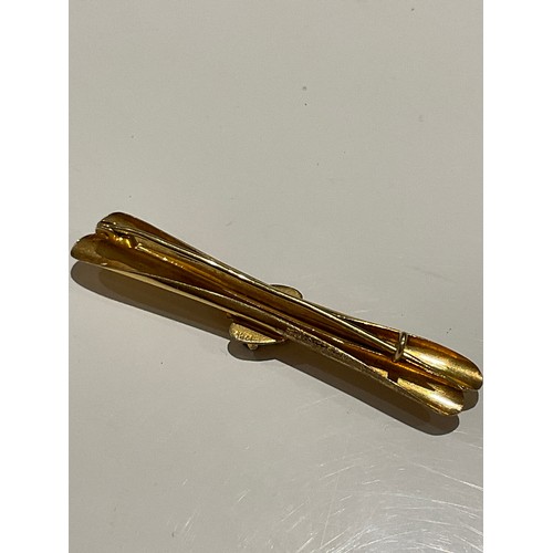 34 - 18ct gold bar brooch with 4 sapphire stones , stamped 18ct , 59mm long x 17.5mm , weight 3.1 grams