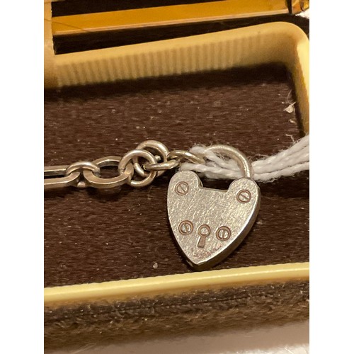 36 - Silver Bracelet 7” length , with heart shaped padlock pendant stamped HG&S silver , weight 7.8 g... 