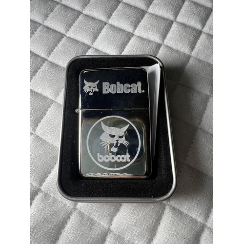 63 - new petrol lighter engraved BOBCAT