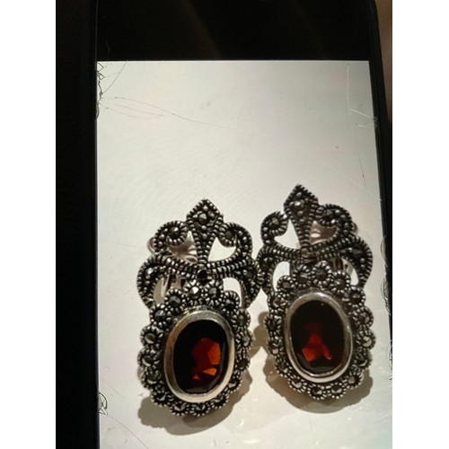 9 - Silver marcasite & red garnet stone clip earrings , vintage deco style with a oval shaped red stone ... 