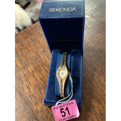 51 - Sekonda ladies watch , heart shaped face , gold tone , in original case with extra strap link . Quar... 