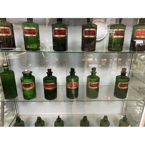 130 - 6 x green ribbed , glass Apothecary bottles with stoppers ( some contents , untested / unknown )