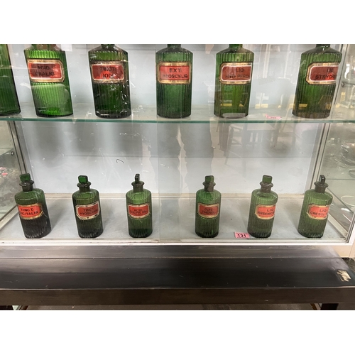 131 - 6 x green ribbed , glass Apothecary bottles with stoppers ( some contents , untested / unknown )