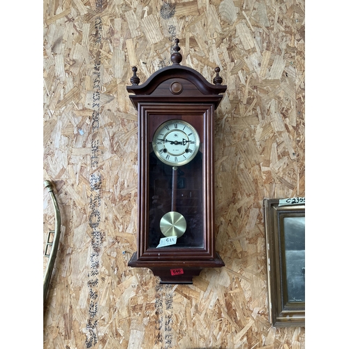 646 - Wall clock , mechanical with key working order , 31 day