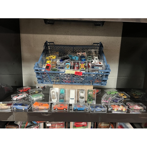 841 - Qty loose diecast cars in display cases