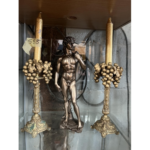 866 - pair candle sticks plus male figure