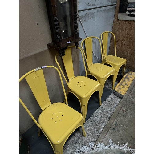 831 - 4 x yellow metal chairs