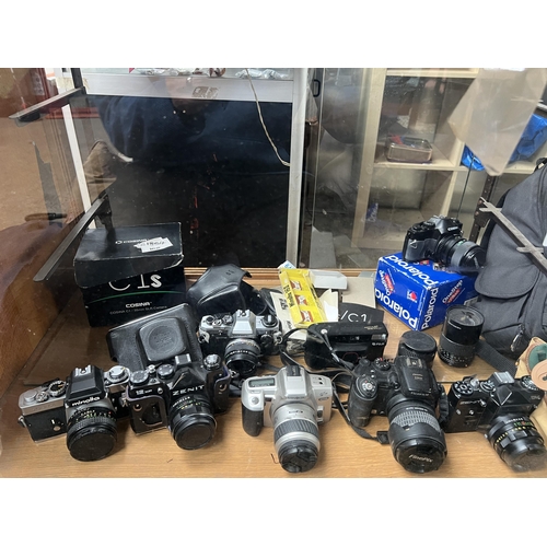 443 - large Qty cameras , film & Digital plus cameras bags & action camera