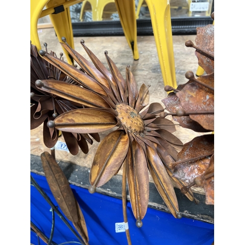 180 - Large metal flower on stick h