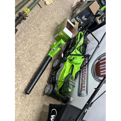 217 - Greenworks cordless mower , blower & strimmer with battery & charger