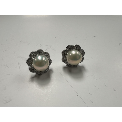 54 - Silver & Pearl earrings 12mm across , 3.9 grams