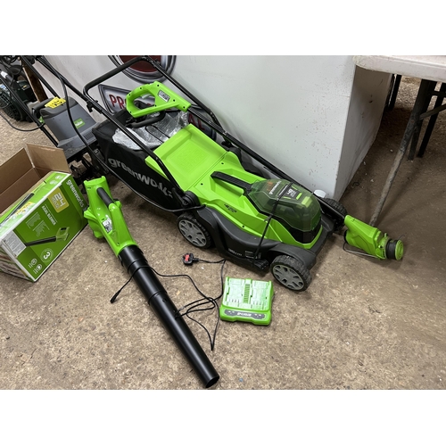 193 - Green works cordless mower , strimmer & blower with battery & charger