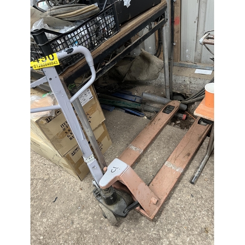 490 - Pallet truck , works but needs service , lowers when use