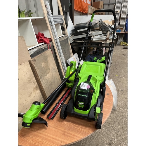 502 - Greenworks cordless mower , blower , strimmer , hedge cutter with battery / charger