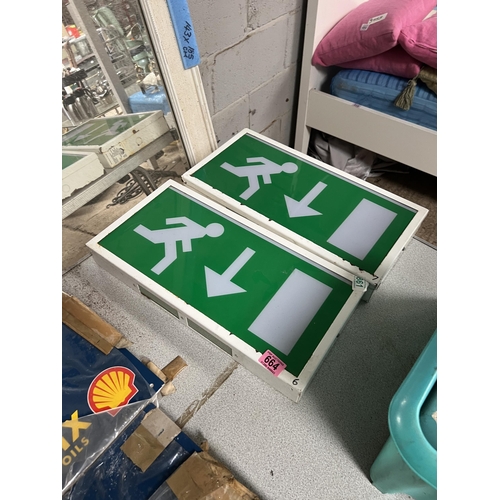 664 - 2 x fire exit signs