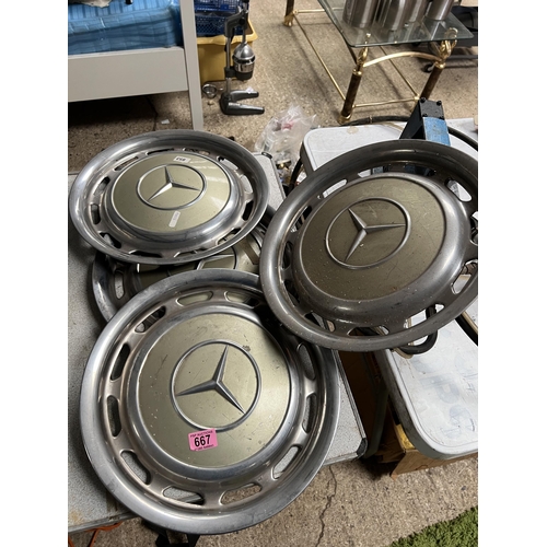 667 - set vintage Mercedes wheel trims